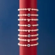 PULSEIRA PÉROLAS OVAIS COM ESPÍRITO SANTO COM ESFERAS E OURO 18K